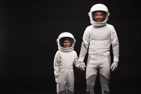 Trained spacemen are smiling together