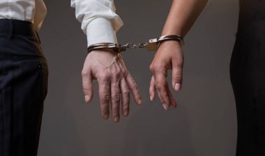 Man and woman are tied with manacles clipart