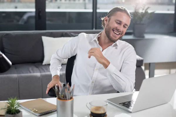 Joyful man having fun in the office — Stock Photo, Image
