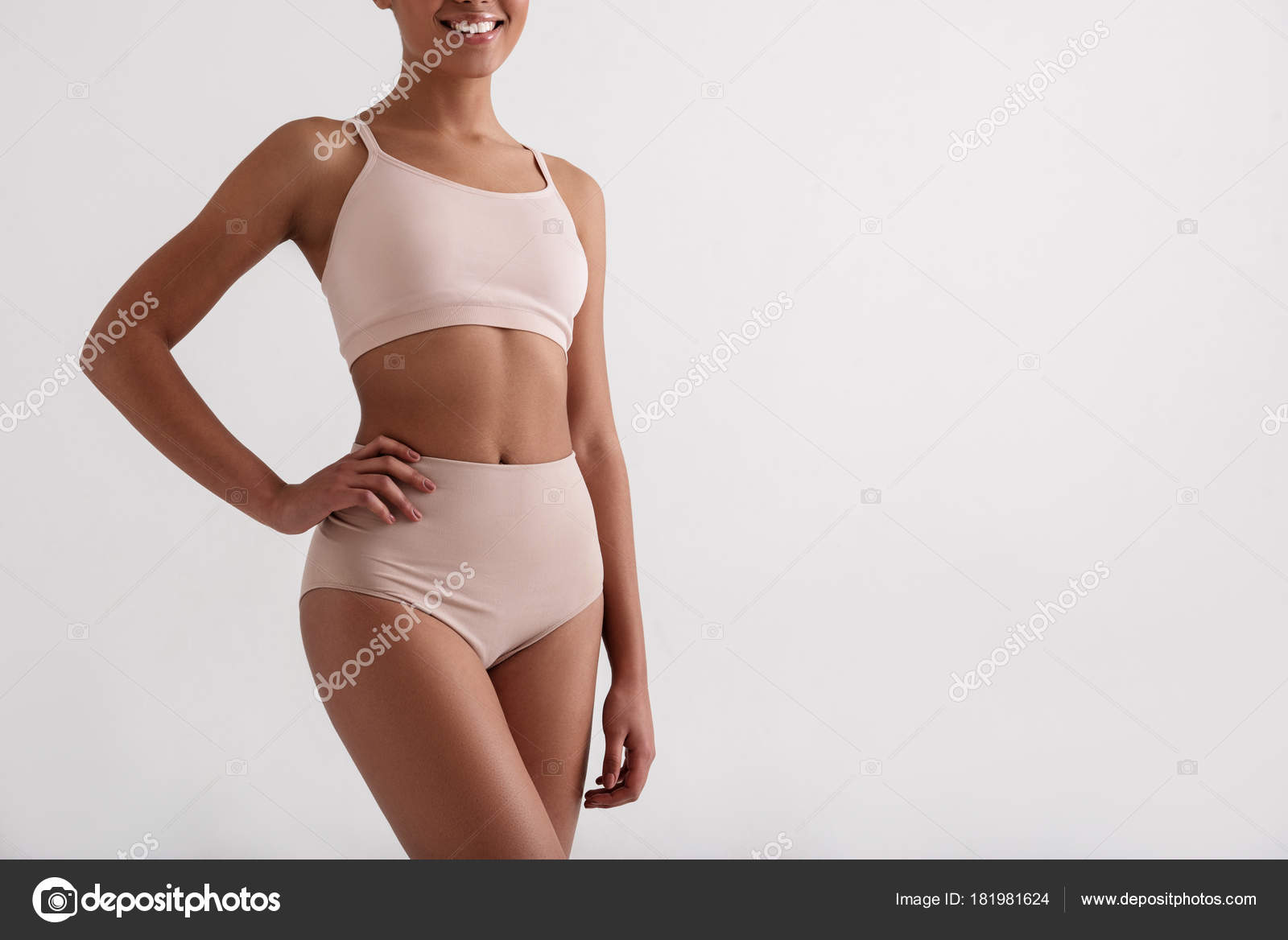 Healthy slender girl posing in underwear Stock Photo by ©iakovenko123  181981624