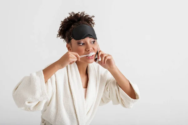 Serene girl cleaning her oral cavity — Stock Photo, Image
