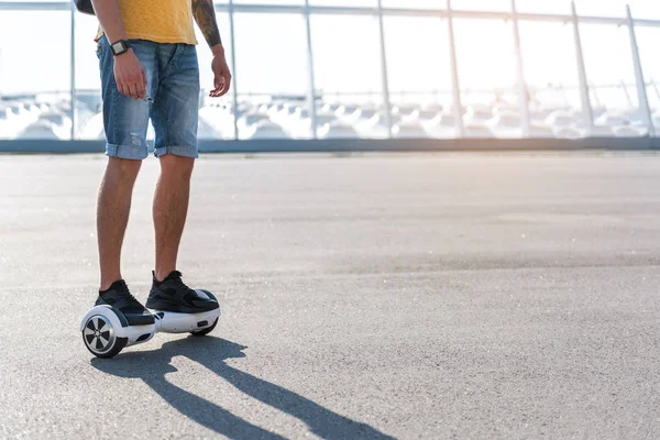 Boy feet situating on gyroscope — Stock Photo, Image