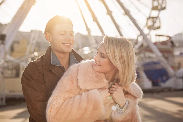 Smiling male and female are feeling fondness — Stock Photo, Image