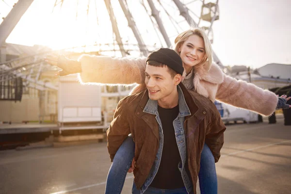 Pleasant lovers are enjoying weather outdoors — Stock Photo, Image