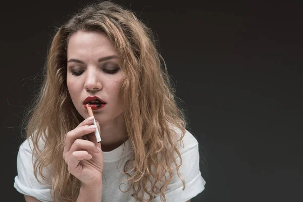 Cheerless woman abusing tobacco smoking — Stock Photo, Image