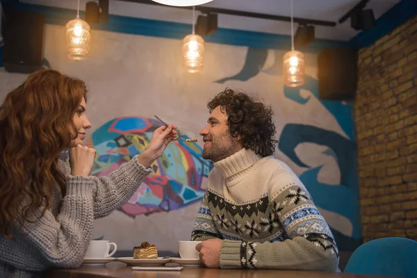 Happy couple having romantic date in cafe — Stock Photo, Image