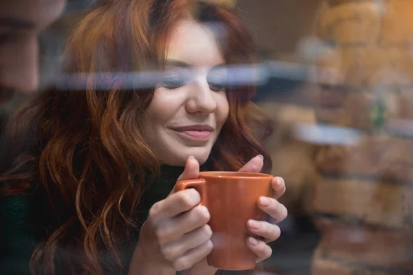 Sensual girl drinking coffee with enjoyment — Stock Photo, Image