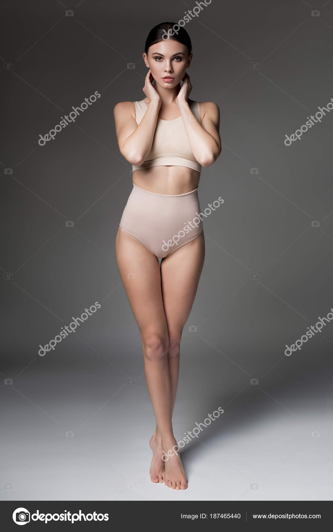 Attractive young woman posing in tight underwear Stock Photo by  ©iakovenko123 187465440