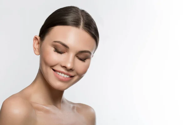 Beautiful young woman is excited about her perfect skin — Stock Photo, Image