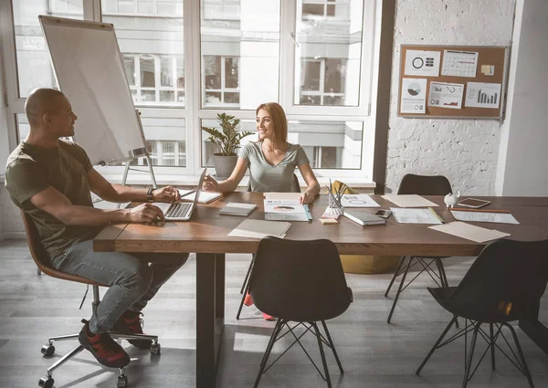 Young coworkers enjoying their working day