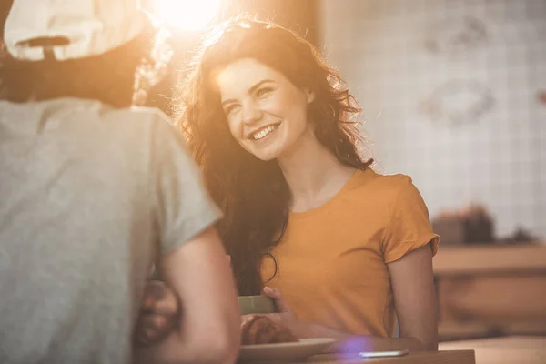 Positive loving couple drinking tea in cafe — Stock Photo, Image