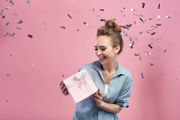 Joyful girl is enjoying her present — Stock Photo, Image