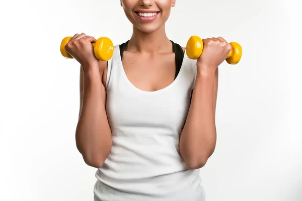 Chica delgada haciendo ejercicio con equipo deportivo —  Fotos de Stock