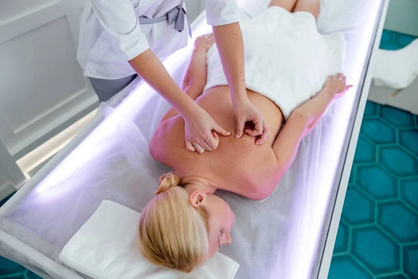 Top view of beautiful woman in spa environment — Stock Photo, Image
