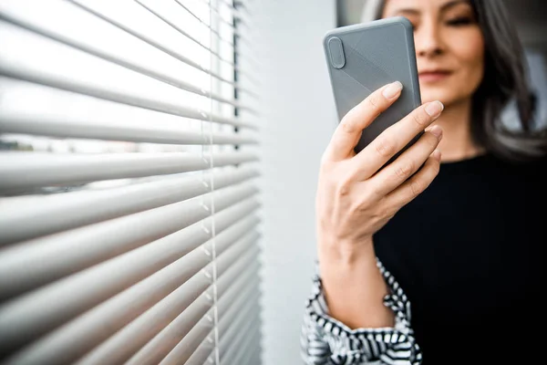 Modern device in hand of adult lady stock photo — Stock Photo, Image