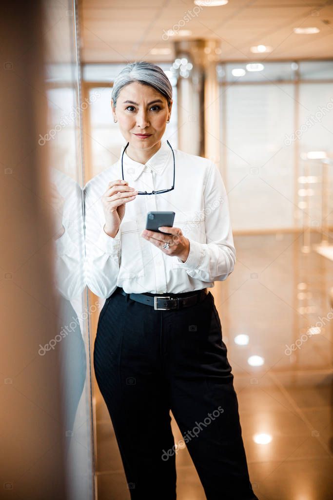 Stylish woman in following office dress code stock photo