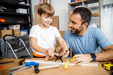 Happy family with hand instruments stock photo