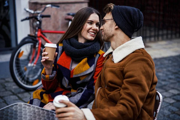 Cute date outdoors with tasty coffee in paper cups stock photo — Stock Photo, Image
