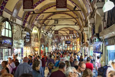 Grand Bazaar in Istanbul with unidentified people. clipart