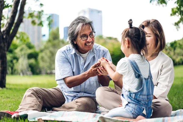 Portrait of happy grandfather with grandmother and little cute g — Stock Photo, Image