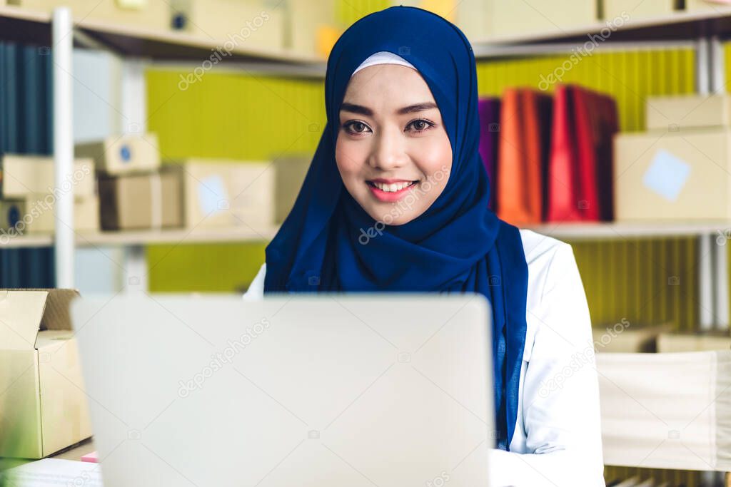 Muslim asian woman freelancer sme business online shopping worki