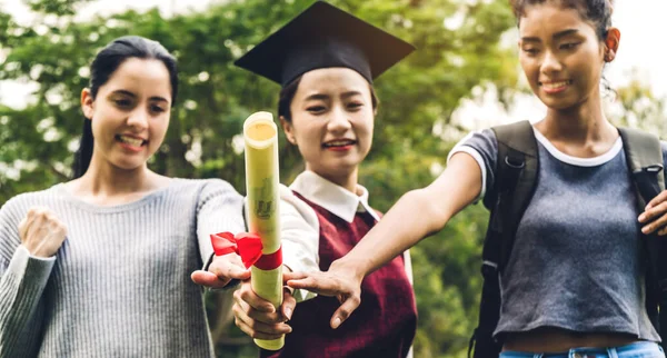 Successful of student young woman and bachelor gowns with diplom — Stock Photo, Image