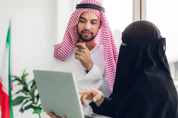 Two arabic business people working with laptop computer.creative — Stock Photo, Image