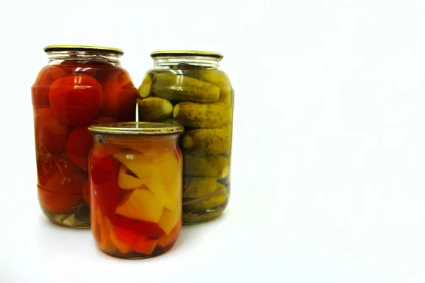 Home canning. Canned vegetables in glass jars on a white background — Stock Photo, Image