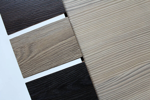 Color swatches of countertops and particle Board.