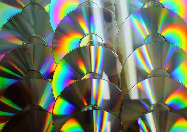 Discos CD y DVD como imagen de fondo — Foto de Stock