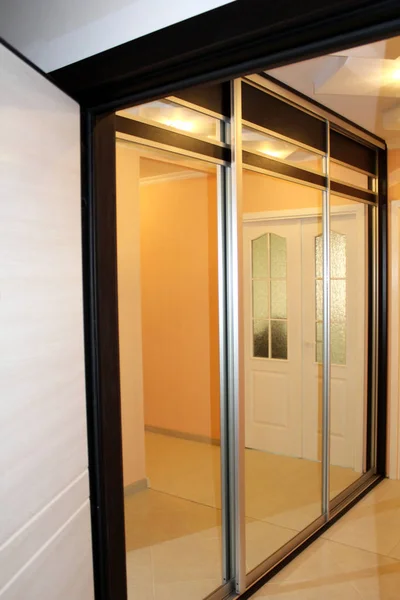 Wardrobe with sliding doors. Furniture. Interior design