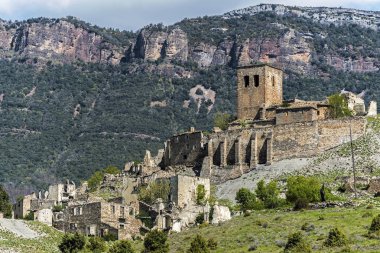 Ruins of abandoned village Esco in Spain  clipart