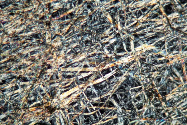 Бумага под микроскопом — стоковое фото