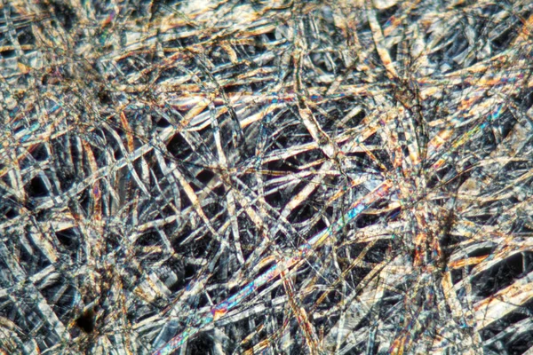 Бумага под микроскопом — стоковое фото