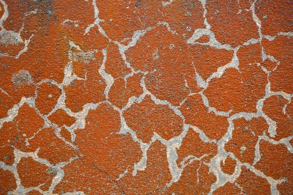 Vieille couleur rousse sur béton — Photo