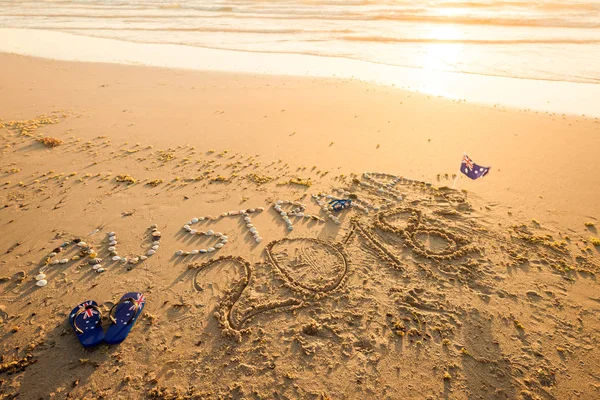 Australia texto con tangas y gafas de sol en la playa —  Fotos de Stock