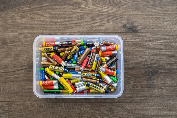 Assortment of used household AA and AAA batteries collected and — Stock Photo, Image