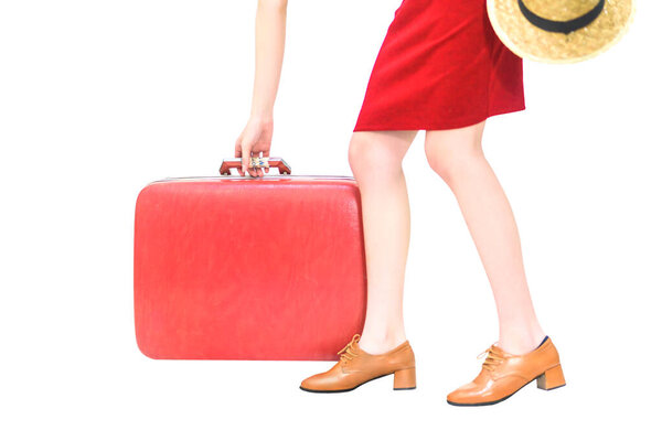 Portrait of Young Tourist Woman holding red Suitcase Bag and Hat