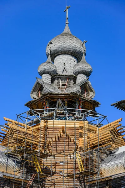 View of Wooden Church of the Transfiguration of the Lord during the Restoration.