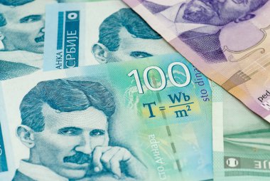 various serbian dinar banknotes spread clipart