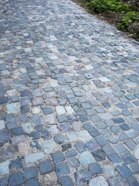 cobblestone road made of small rocks