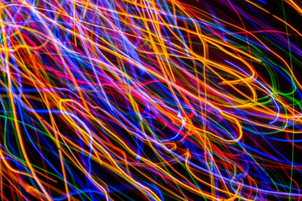 Colorful lights on the long exposure with motion background, Abs