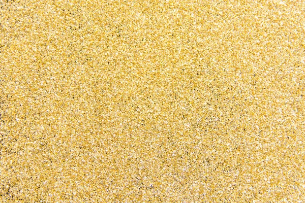 Defokussiert Goldglitzerhintergrund. Gold abstrakter Bokeh-Hintergrund — Stockfoto