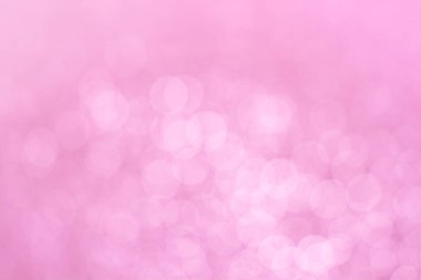 Abstract defocused lights pink tone lights background.