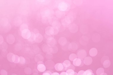 Abstract defocused lights pink tone lights background.