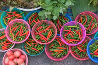 Hot chilli Paprika (Chilli Padi, Bird's Eye Chilli, Bird Chilli, Thai pepper) in a basket at the Thailand market