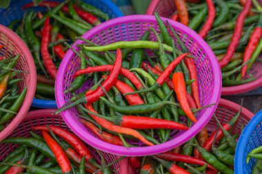 Hot chilli Paprika (Chilli Padi, Bird's Eye Chilli, Bird Chilli, Thai pepper) in a basket at the Thailand market