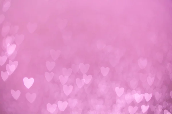 粉色心形背景的离焦灯 — 图库照片