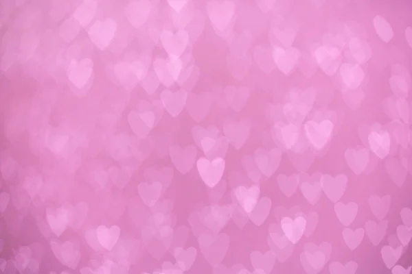 粉色心形背景的离焦灯 — 图库照片