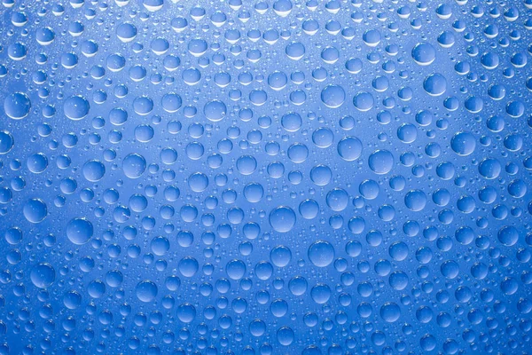 Νερό Ρίχνει Μπλε Φόντο Σταγόνες Νερού Γυάλινο Φόντο — Φωτογραφία Αρχείου